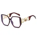 Monture de lunettes hexagonale tendance en thé foncé avec branches métalliques dorées - Monture Marron Foncé