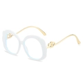 Lunettes à monture blanche ondulée avec branches double cœur dorées et verres ovales - Blanc / Verres transparents