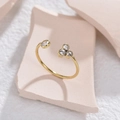 Minimalistischer goldener verstellbarer offener Ring mit vier funkelnden Kristallen - Einstellbar Offen / Gold