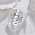 Silver multi-layer open ring with five parallel bands and flat circular metal discs - Steel