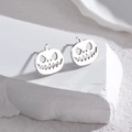 Silver stainless steel pumpkin stud earrings with cutout Jack-o'-lantern design - Steel