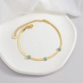 Detail of gold snake chain bracelet with three turquoise stones in stainless steel - Snake Chain With Three Stones Style (B964)