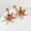 Gold starfish drop earrings featuring red coral stone beads and white pearls - Red Coral Starfish Pendant (E641)