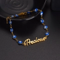 Pulsera personalizada dorada con cuentas de ojo azul y colgante de letras Precious - Pulsera / Color Acero