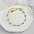 Golden beaded butterfly bracelet with turquoise beads and adjustable lobster clasp - Gold Bead and Turquoise Bead Style (B965)