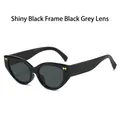 Occhiali da sole cat eye con montura nero lucido, lenti grigie e fiocco dorato - Montatura Nero Lucido Lente Grigia