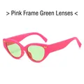 Occhiali da sole cat-eye rosa con lenti verdi e dettaglio decorativo a fiocco dorato - Montatura Rosa Lente Verde