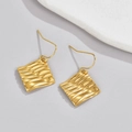 Minimalist square earrings with 18K gold textured wave pattern on light grey background - Gold Style (E574-fx)