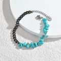 Bracelet chaîne gris foncé avec pierres turquoise et médaillon S.steel sur blanc - Chaîne Noire Pierre Bleue