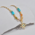 Bohemian beaded star pendant necklace with sunburst charm and turquoise blue accents - Eight-pointed Star Style