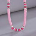 Handmade gradient pink and white heishi bead necklace with gold spacer accents - Pink