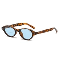 Fashionable tortoise shell sunglasses with light blue lenses and metal dot accents - Leopard Frame Blue Lens