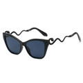 Occhiali da sole neri cat-eye con stanghette a forma di serpente e dettagli occhi rossi - Montatura Nera Lenti Grigie