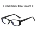 Schlanke schwarze rechteckige Sonnenbrille mit klaren Gläsern und Silbernieten - Schwarzer Rahmen Klare Gläser