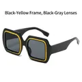 Gafas de sol cuadradas con montura bicolor negro y amarillo y lentes gris oscuro - Montura Negra Amarilla Lentes Grises