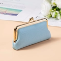 Close-up of light blue lychee pattern leather lipstick bag with gold metal clasp - Sky Blue