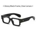 Glossy black square sunglasses with clear lenses and golden rivet details on the frame - Regular / Regular (Includes 13% VAT) Glossy Black Frame with Clear Lenses
