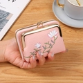 Pink lychee texture mini wallet for women featuring floral embroidery and metal clasp - Pink