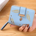 Short PU leather light blue wallet with hollow leaf design and metal pendant leaf detail - Sky Blue
