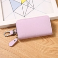 Light purple lychee grain PU leather key pouch with silver zipper and spring hook - Purple