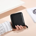 Classic black leather bi-fold wallet for men with secure metal zipper and fine stitching - Black