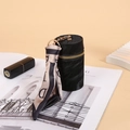 Black velvet cylinder coin pouch with a luxury silk scarf ribbon and golden hardware - Black
