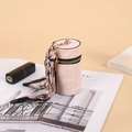 Pink marble texture cylinder coin purse with silk scarf detail and gold zipper closure - Pink