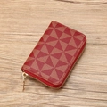 Mini zipper wallet with red and beige geometric pattern on a wooden background - Red