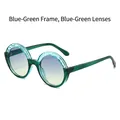 Retro round sunglasses featuring teal transparent frames with stylish cracked texture - Blue Green Frame Blue Green Lenses