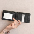 Slim carbon fiber bifold wallet for men with money clip and transparent ID window - Black