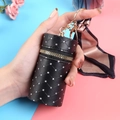 Mini borsa a secchiello in pelle nera trapuntata con strass e nastro di seta - Nero