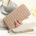 Elegant beige matelasse quilted long wallet with wrist strap and zipper closure - Khaki