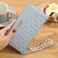 Light blue women's long zipper wallet with quilted texture and bohemian wrist strap - Light Blue