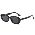 Fashion oversized irregular black sunglasses with thick frames shown at 45-degree angle - Black Frame Grey Lens