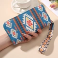 Lange bohemien portemonnee met geometrische print en polsband in blauw en oranje - Blauw