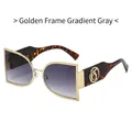 Gafas de sol doradas de media montura con cristales degradados grises y patillas de carey - Marco Dorado Gris Degradado