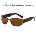 Futuristic oval sunglasses featuring bronze frames and tinted tea-colored lenses - Bronze Frame Brown Lens