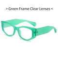 Lunettes œil de chat avec monture verte transparente et verres clairs au design géométrique - Standard / Standard (TVA 13 % incluse) Monture verte verres clairs