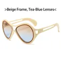 Beige cat-eye sunglasses with tea blue gradient lenses and hollow geometric temples - Beige Frame Tea Blue Lens