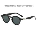 Gafas de sol redondas retro con montura negra brillante y lentes en gris oscuro - Gafas de sol / Montura Negra Lentes Gris Negro