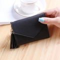 Slim tri-fold black women wallet with pebble grain texture and stylish tassel pendant - Black