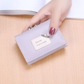 Short lavender faux leather tri-fold wallet with pearl pin and kiss-lock closure - Light Purple
