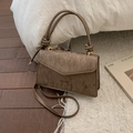 Vintage bronze handbag with metallic texture, knotted handle and sleek crossbody strap - Brown