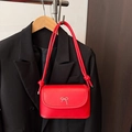 Borsa a tracolla in pelle lucida rossa con fiocco argento e cinturino annodato - Rosso