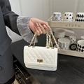 Elegant white quilted chain bag with gold rotary lock and leather strap detail - White