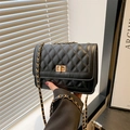 Black quilted crossbody bag with gold turn-lock and leather-chain strap - Black