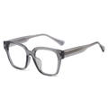 Stylish oversized TR90 grey frame glasses with silver star rivets on white background - Transparent Grey Frame Clear Lens
