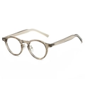 Retro round TR90 eyeglasses frame in transparent amber tea color for a trendy vintage look - Champagne Frame / Clear Lens