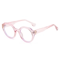 Lunettes géométriques rose translucide avec charnières en métal doré pour femmes - Monture Rose Verres Transparents
