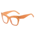 Lunettes œil de chat orange translucide avec design géométrique à facettes - Monture Orange Verre Transparent